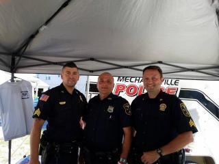 Sergeant Alex Dunn, Officer Dee Pugliese (Ret), and Chief Bill Rabbitt